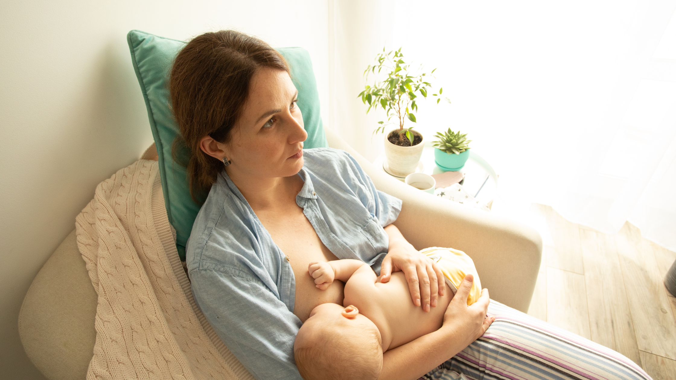 Cradle hold breastfeeding position